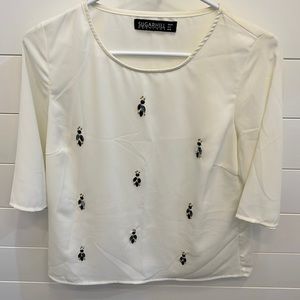 Short sleeve beaded top size 6